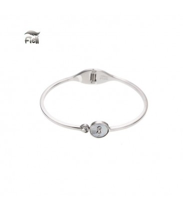 Zilverkleurige spang armband met cirkel en een steentje