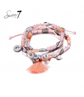 Set van armbanden met roze kraaltjes en 'love'