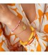 oranje armband met goudkleurige bedels