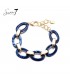 Blauwe armband met goudkleurige schakels