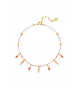 Oranje gekleurde enkel armband met glas kralen