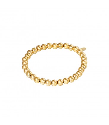 Goudkleurige armband van grote kralen