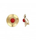 Goudkleurige oorclips met een rood steentje