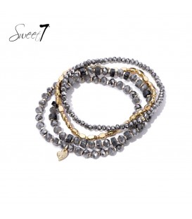 Grijze armband met glaskralen en goudkleurige accenten