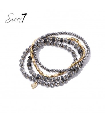 Grijze armband met glaskralen en goudkleurige accenten