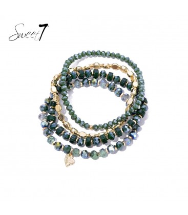 Smaragd groene armband met glas kralen en goudkleurige accenten