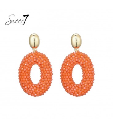 Oorbellen oranje met glas kralen en een goudkleurig oor stukje