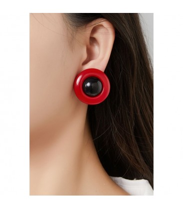 Oorclips van zwart en wit acrylaat in ronde vorm