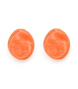 Vrolijke oorclips in warme oranje tint