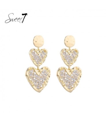 Oorbellen met dubbele harten en beige steentjes