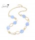 Mooi blauwe schakelketting met goudkleurige elementen