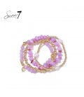 Armband met roze en paarse kralen in trendy stijl