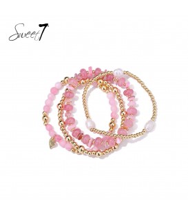 Armbanden set in roze met pareltjes en goudkleurige accenten