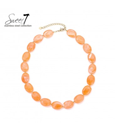 Halsketting met oranje kralen en verstelbare sluiting