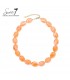 Halsketting met oranje kralen en verstelbare sluiting