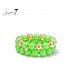 Armband met neon groene kralen en goudkleurige accenten