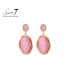 Oorbellen met roze cat eye steen en goudkleurige rand