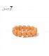 Armband met oranje hart kralen en goudkleurige detail