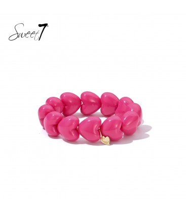 Armband fashion sieraad met roze hartjes