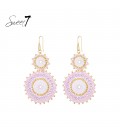 Oorbellen met roze kralen en elegante cirkelvorm design
