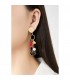 Oorclips goudkleurig met octopus bedel en parel details