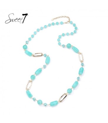 Halsketting met turquoise kralen en goudkleurige schakels