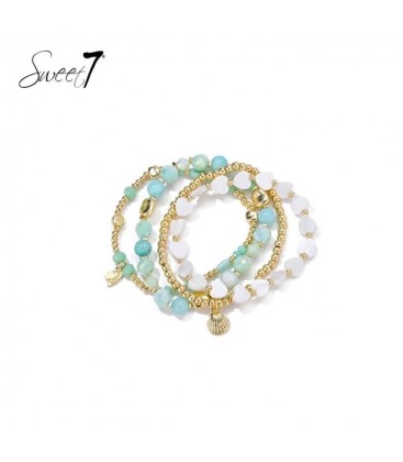 Armband groen met witte harten kralen met goudkleurige details